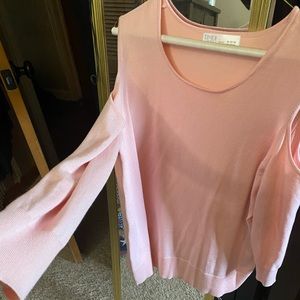 Pink sweater, open shoulders